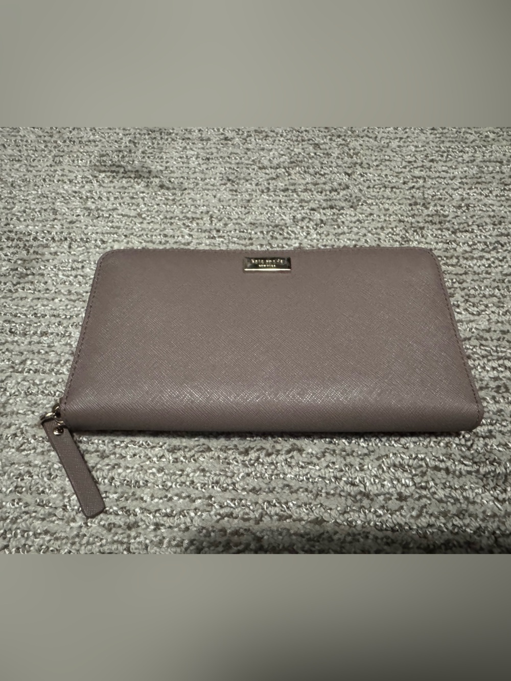 Kate Spade tan zip-around wallet in taupe